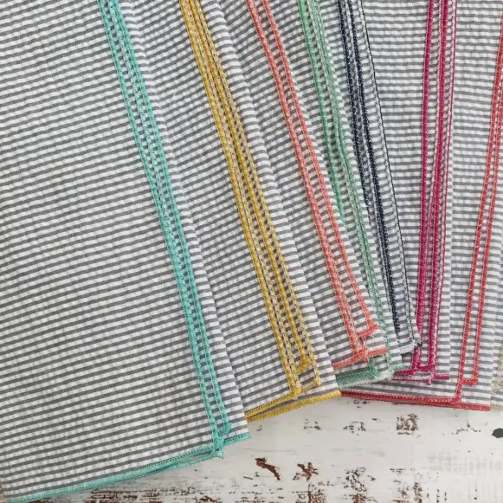 Handcrafted grey seersucker cloth napkins with colorful edges, set of 8