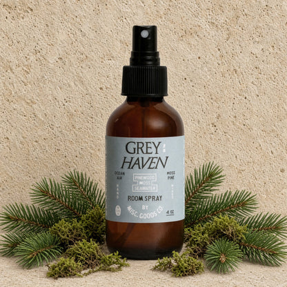 Brown glass bottle greyhaven room spray with black spray nozzle blending sea air pinewood and cedar scent