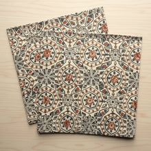 Two hand block printed fair trade organic cotton cloths with intricate geometric patterns