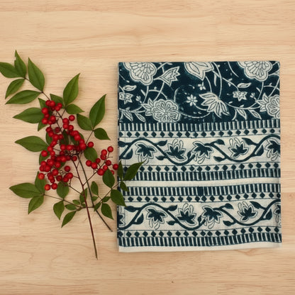 Hand block printed fair trade cloth napkin with dark teal and cream floral pattern