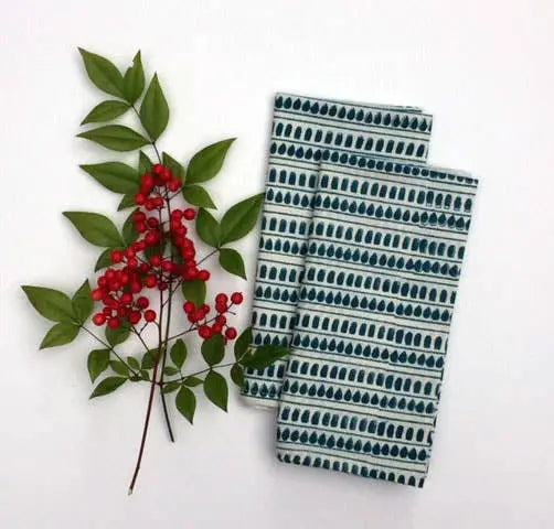 Hand block printed fair trade Mehera Shaw green leaf and berry organic cotton fabric with napkins