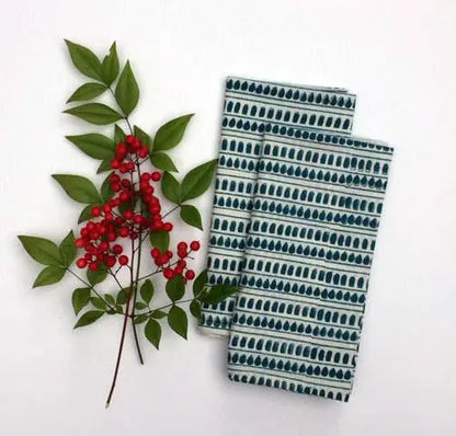 Hand block printed fair trade Mehera Shaw green leaf and berry organic cotton fabric with napkins