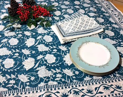 Teal floral hand block printed cotton tablecloth with napkins and plates by Mehera Shaw
