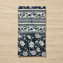 Hand block printed black and white cotton hand towel with intricate floral and geometric designs using azo-free dyes