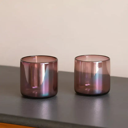 Hand blown iridescent purple glass candle holders from family run workshop