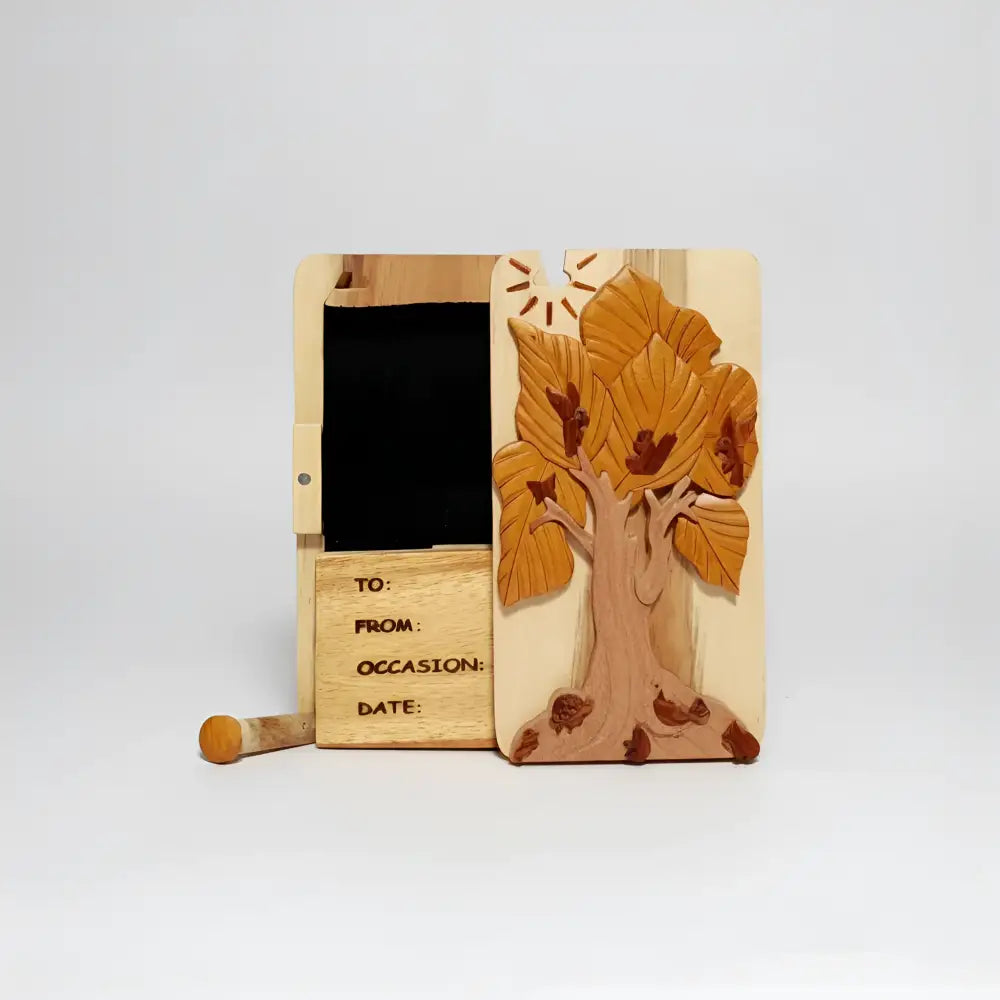 Hand carved wooden tree box with autumn leaves birds natural wood tones and engraved fields for personalization
