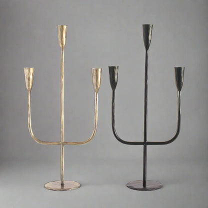 Two hand-forged iron candelabras in gold and black finishes by expert blacksmiths for premium feel decor