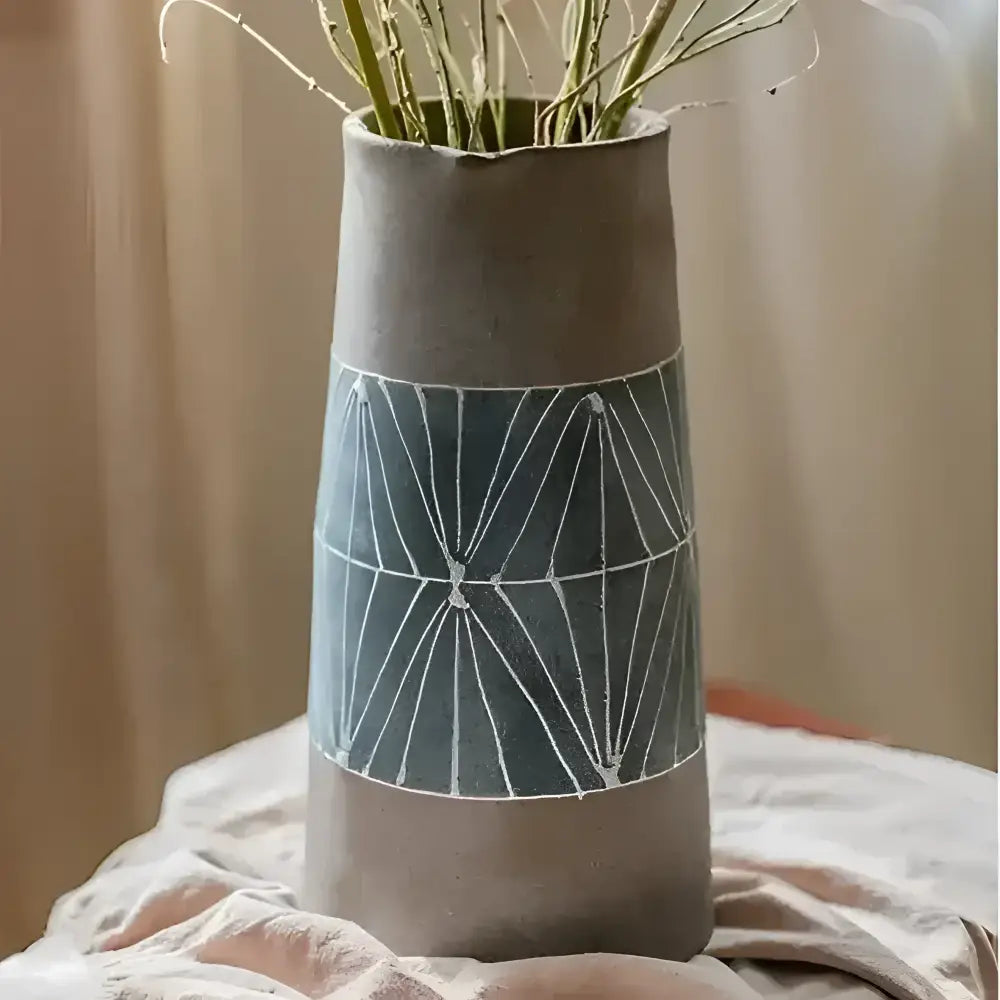 Tall grey ceramic table pitcher with hand-painted terracotta geometric pattern