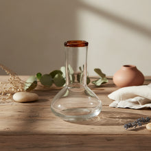 Handblown bulb vase with amber rim for single stems or buds