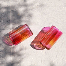 Hand blown glass tumbler in vibrant gradient colors, 
