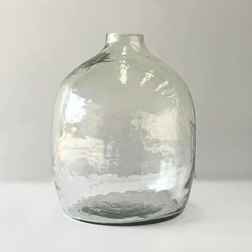Handblown hammered glass vase with short neck, made from recycled glass for a rustic look