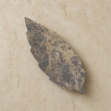 Handmade carved soapstone leaf dish in mottled gray and beige with subtle white veining for decorative use
