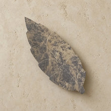 Handmade carved soapstone leaf dish in mottled gray and beige with subtle white veining for decorative use