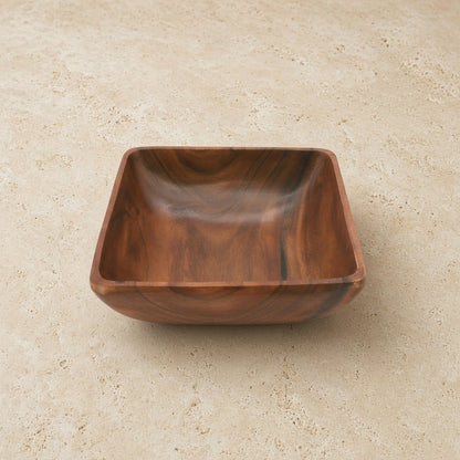 Handmade acacia wood salad bowl with a warm brown finish and natural grain in a square shape for serving