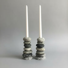Handmade eco-friendly Cairn Stone Candle Holder with white candles and natural stones