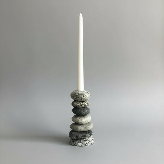 Handmade eco-friendly Cairn Stone Candle Holder with white candles and natural stones