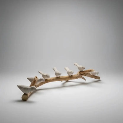 Handmade eco-friendly wooden branch with six handcrafted ceramic bird figurines for decor