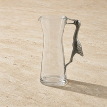 Handcrafted clear glass carafe with stunningly designed pewter egret handle featuring extraordinary egret design