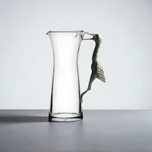 Handcrafted glass carafe with pewter egret handle
