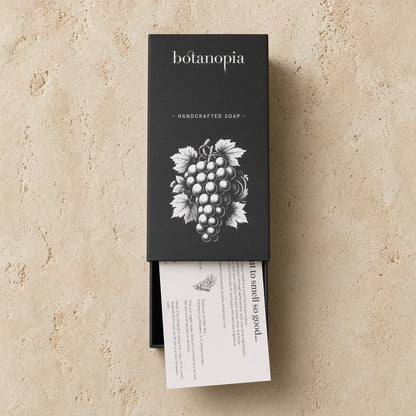 Botanopia handcrafted grape soap in black box with white grape illustration made with olive oil for gentle cleansing