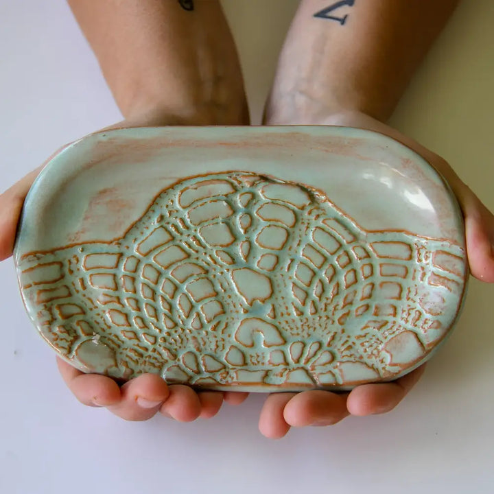 Handmade stoneware soap dish with lace patterns for customers bathroom