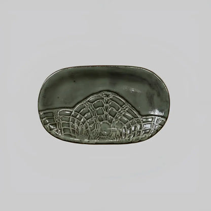 Handcrafted stoneware dish with lace pattern in matte gray glaze