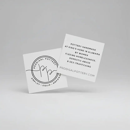 White square Prodigal Pottery cards with black minimalist typography and circular logo