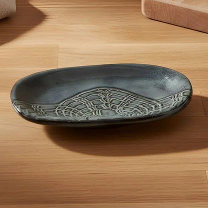Handcrafted stoneware soap dish with lace pattern for customers bathroom