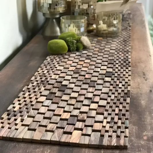 Woven Rosewood Table Runner with Teak and Succulent Centerpiece on a rosewood table