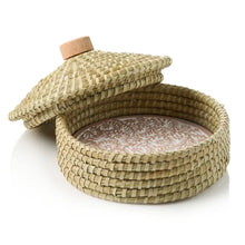 Handmade woven seagrass bread basket with wooden handle, lid, and warming stone