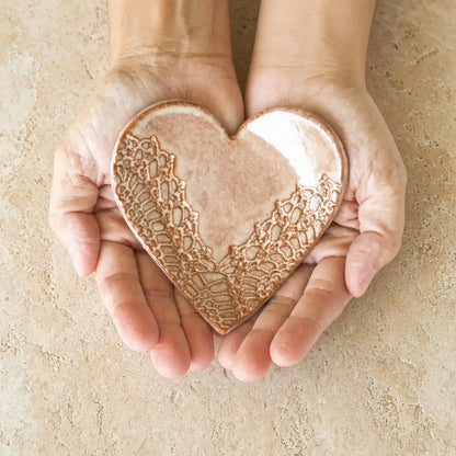 Handmade ceramic heart trinket dish in copper tone with lace pattern perfect as a heart trinket ring holder