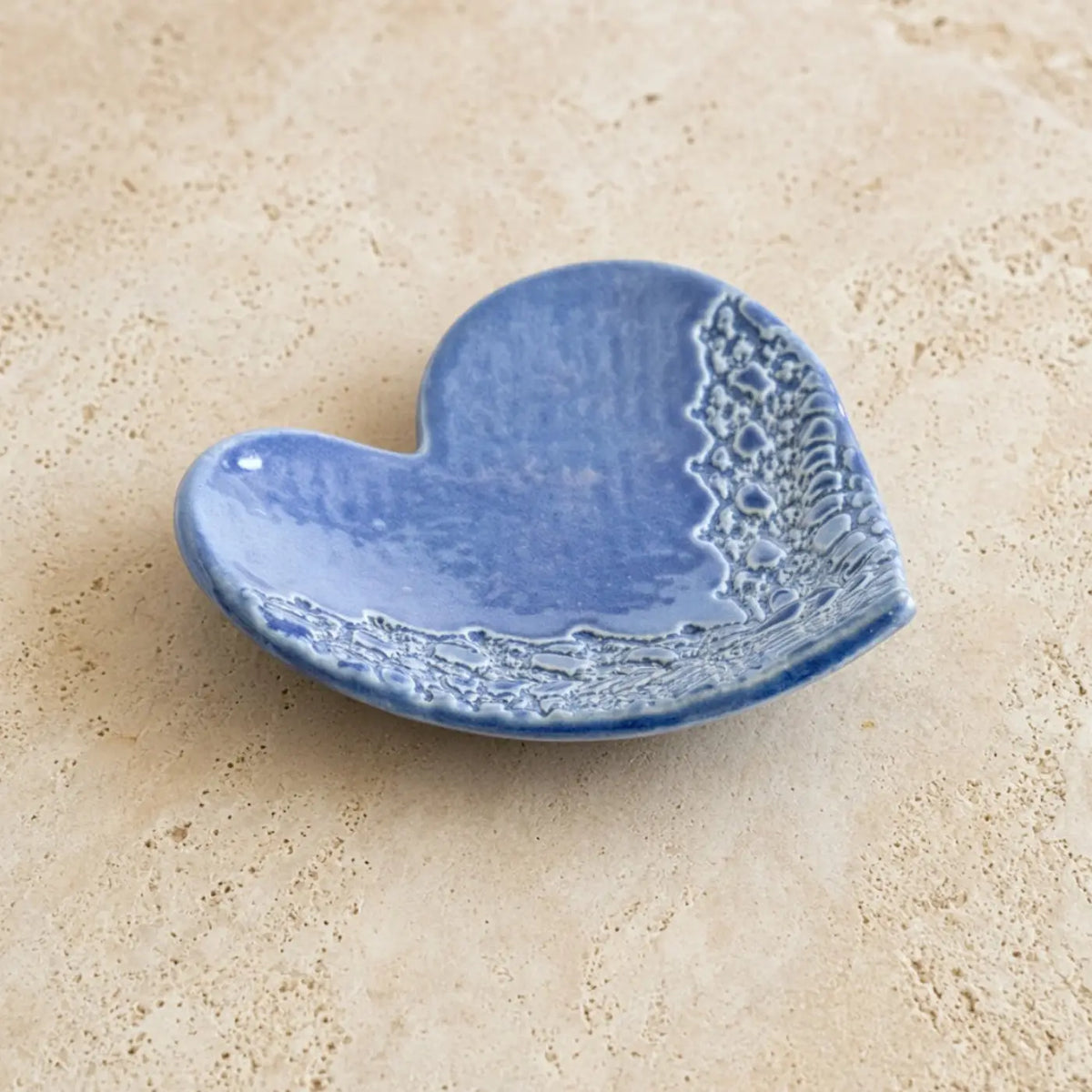 Handmade ceramic heart trinket dish in blue with textured lace pattern perfect as a heart trinket ring holder
