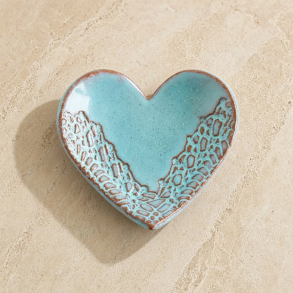 Handmade ceramic heart trinket dish in turquoise with a brown lace pattern perfect as a heart trinket ring holder