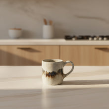 Handmade ceramic mug with unique glaze combo from Borealis Collection, eco-friendly design