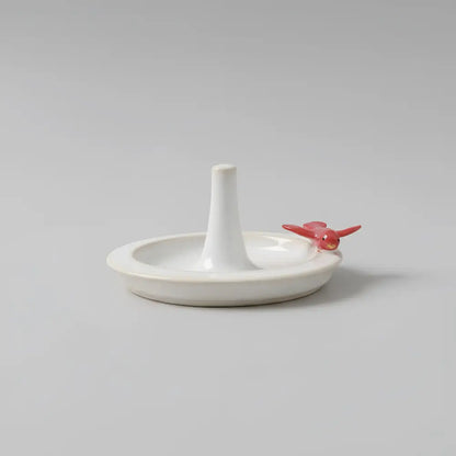 Handmade white ceramic ring dish with red bird design