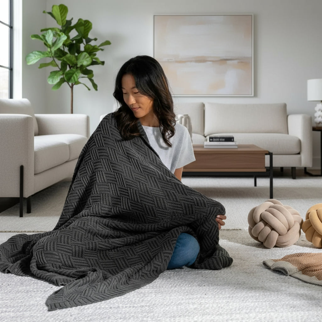 Handmade charcoal herringbone cotton throw blanket with textured weave