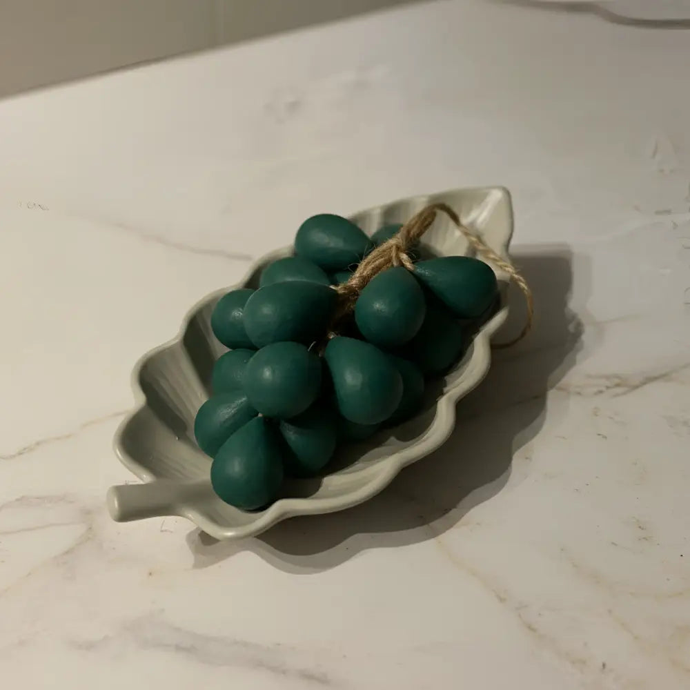Handmade arabica leaf dish with teal-green grape ornaments