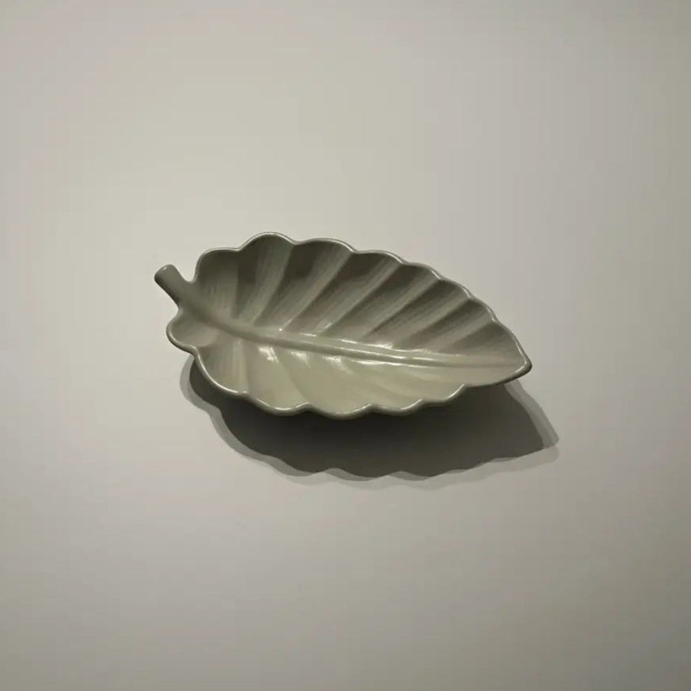 Sleek handmade arabica leaf dish in matte ceramic with vein ridges