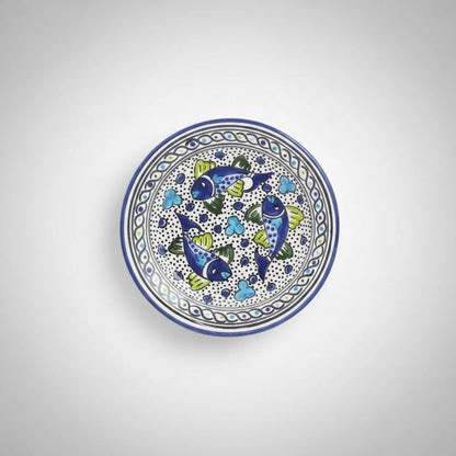 Handmade dinner plate with colorful fish design in food-safe paint