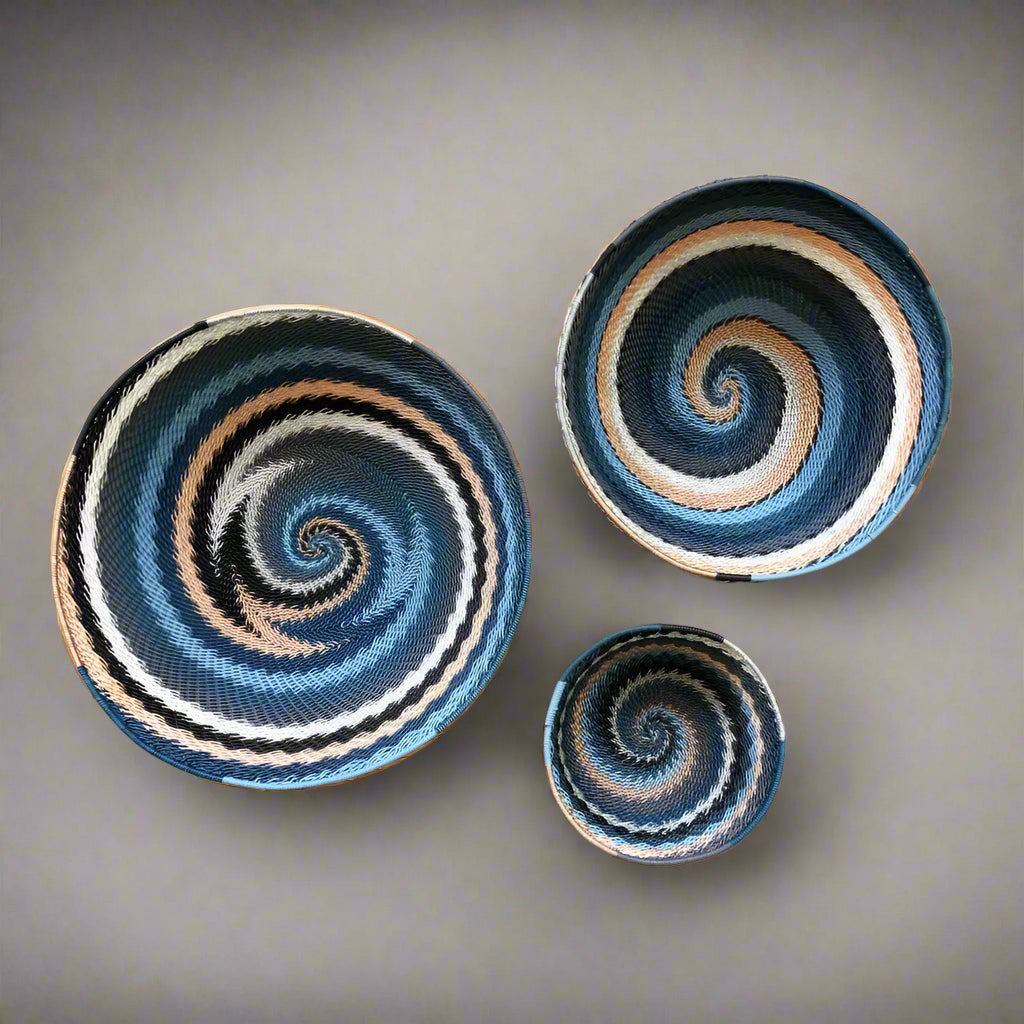 Colorful South Africa city lights woven baskets with blue, black, white, orange spirals