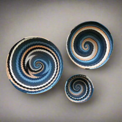 Colorful South Africa city lights woven baskets with blue, black, white, orange spirals