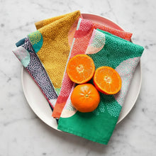 Colorful handmade eco-friendly linen napkins with tangerines for a cozy vibe
