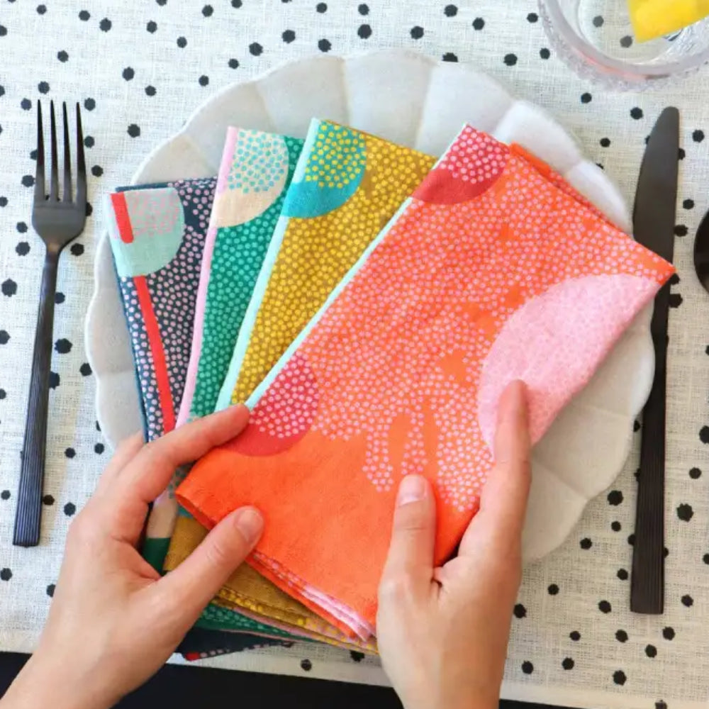 Colorful handmade eco-friendly linen napkins set with vibrant patterns and bold colors