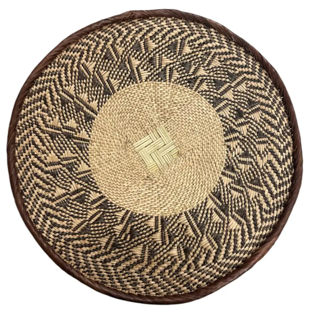 Handmade eco-friendly palm leaves basket from Zimbabwe with geometric patterns