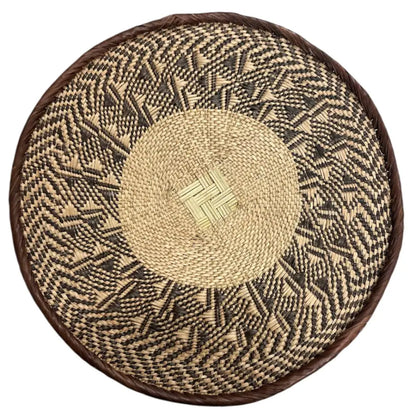 Handmade eco-friendly palm leaves basket from Zimbabwe with geometric patterns