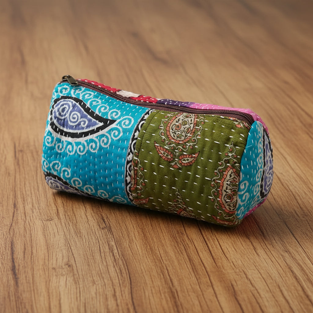 Handmade eco-friendly patchwork quilted pencil case with colorful paisley patterns and green fabric