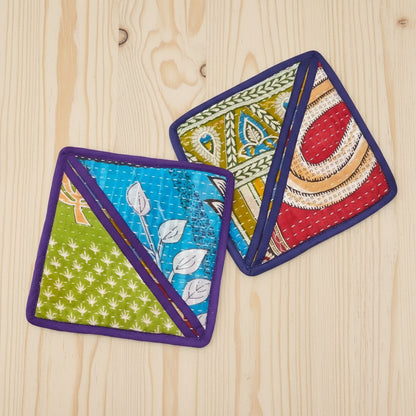 Colorful handmade eco-friendly pot holder with geometric patterns and purple edges