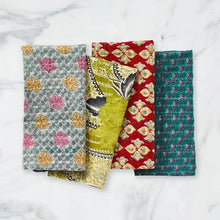 Colorful handmade eco-friendly fabric napkins with floral and geometric patterns