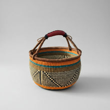 Handmade elephant grass market basket with leather handle and colorful stripes eco-friendly style