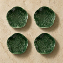 Set of four handmade green lotus leaf small ceramic plates in dark green showcasing organic beauty